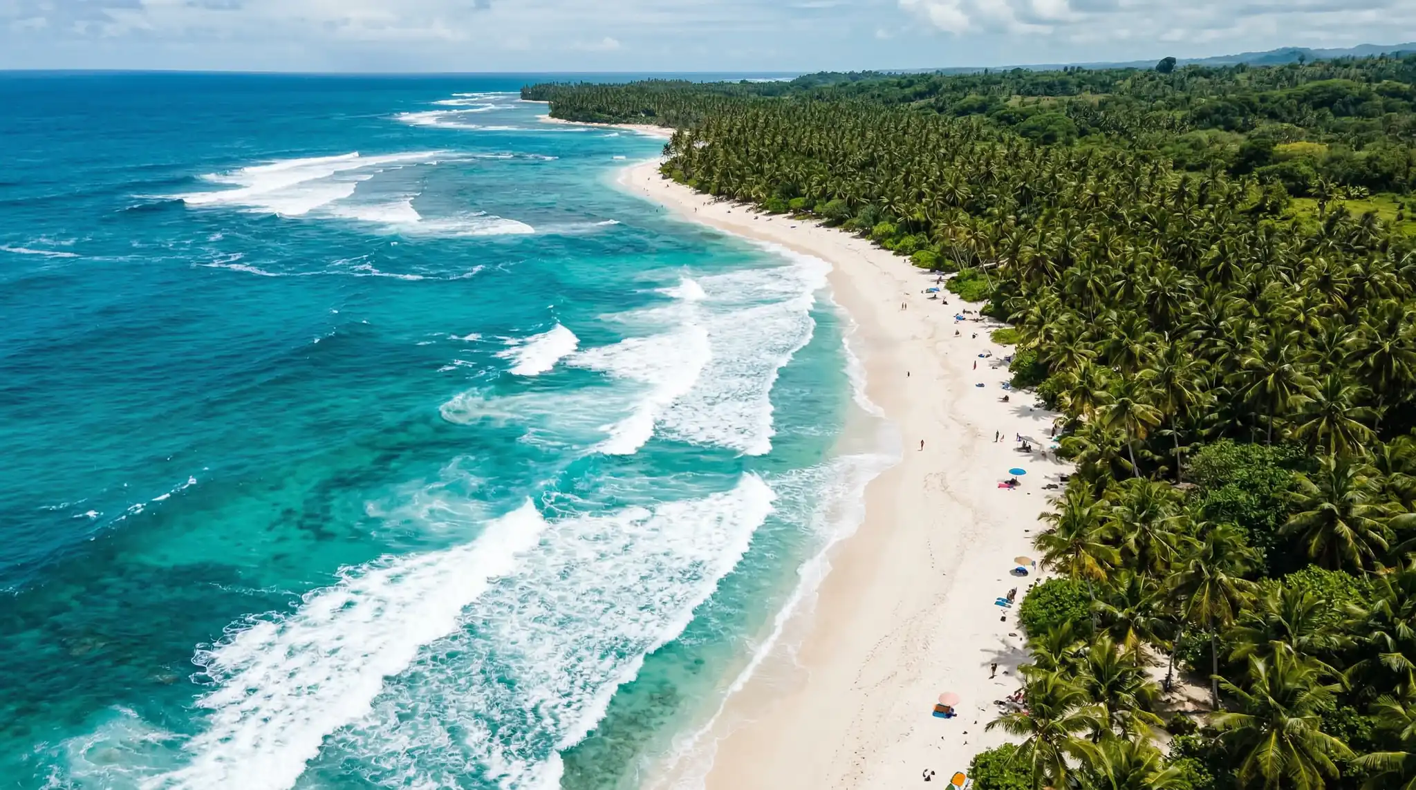 AI Prompts for Drone-Style Aerial Videos 4 Aerial drone shot of turquoise ocean waves on white sand beach with palm trees